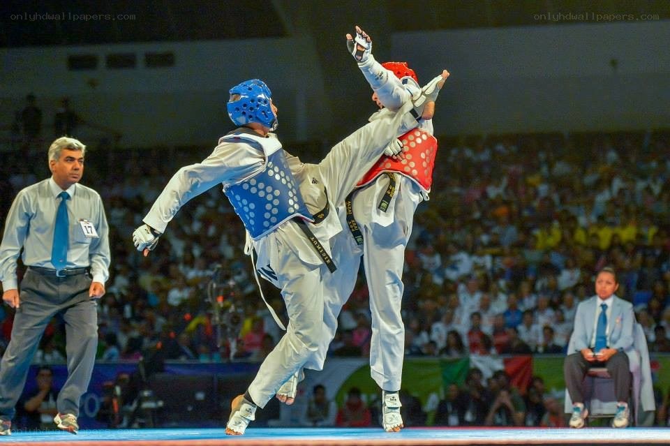 Taekwondo match in action