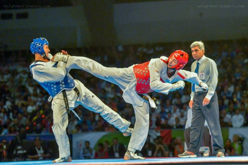 Taekwondo match in action