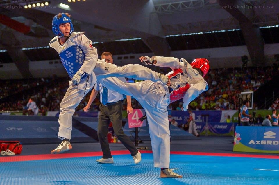 Taekwondo match in action