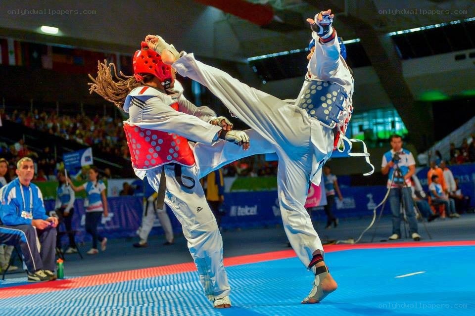 Taekwondo match in action