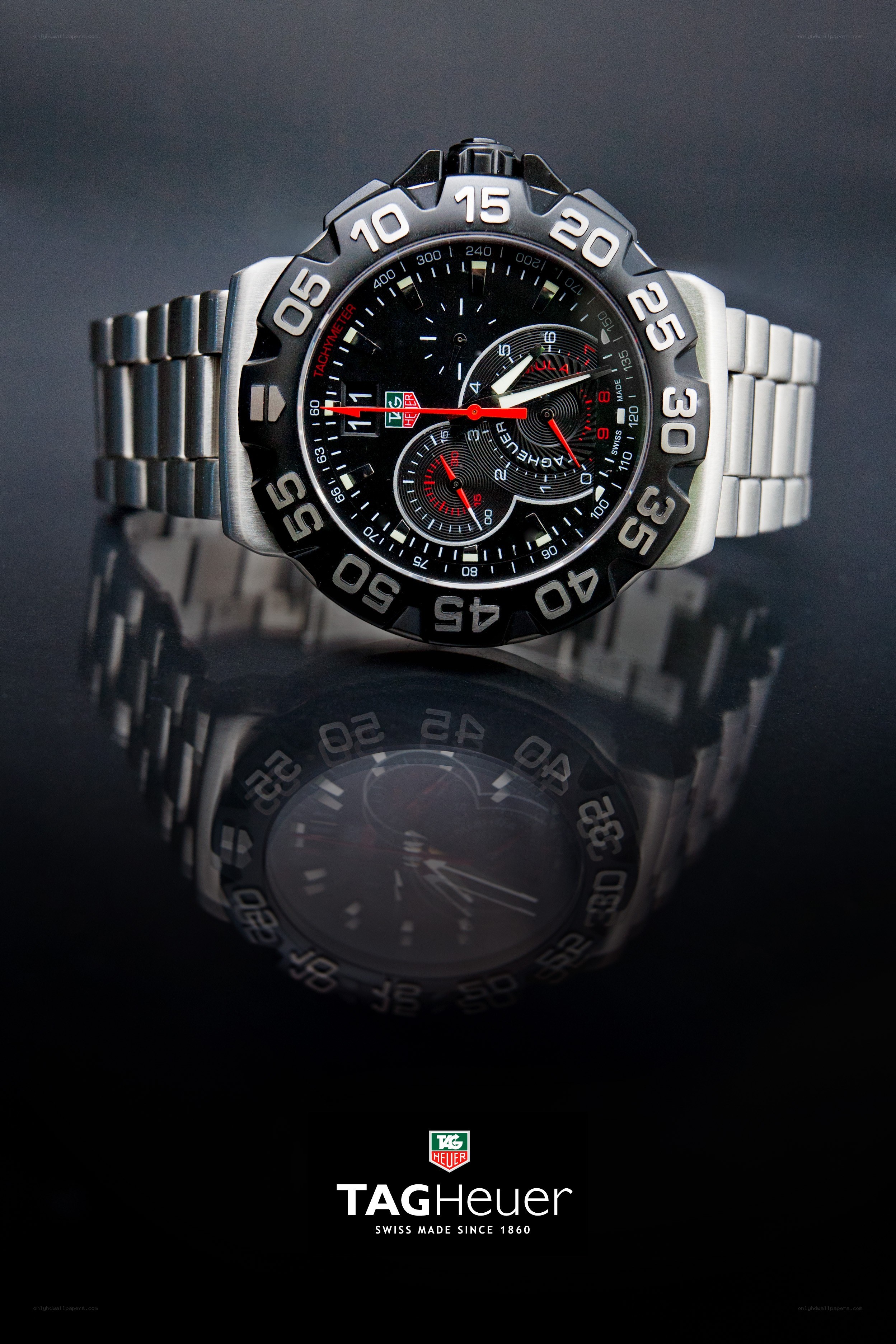TAG Heuer watch on black surface