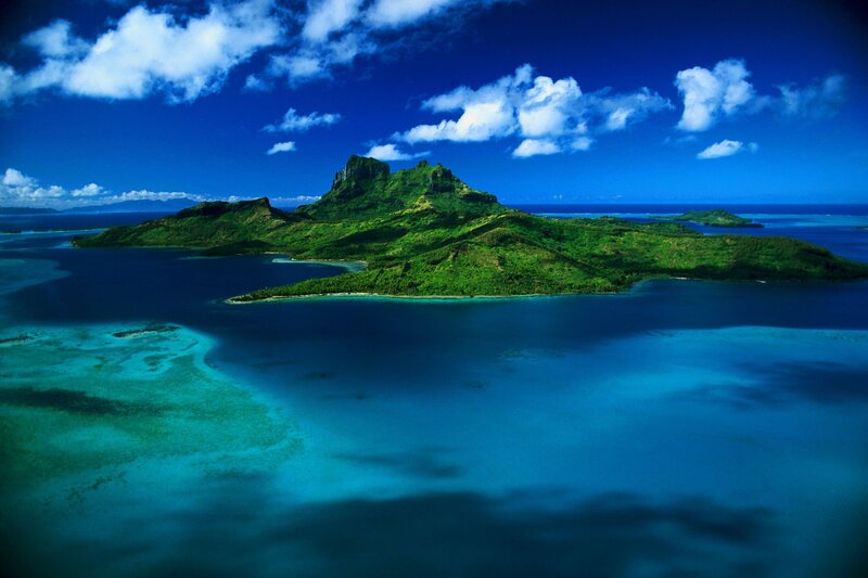 Tahitian island with lush green mountains