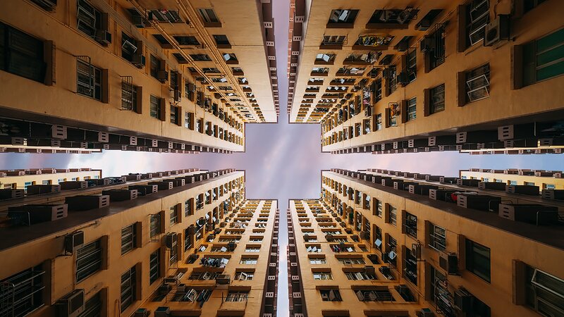 Tall Apartment Buildings — Yellow, Dramatic