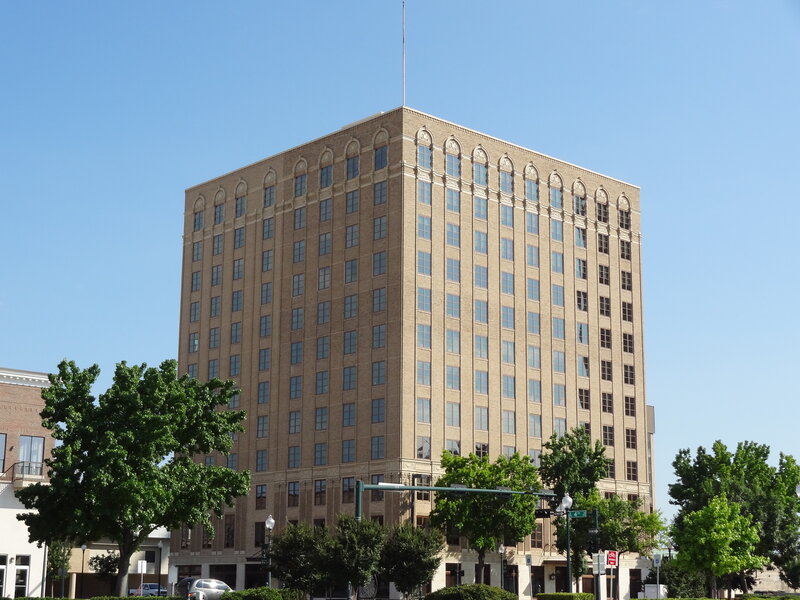 Tall Brick Building — Brown
