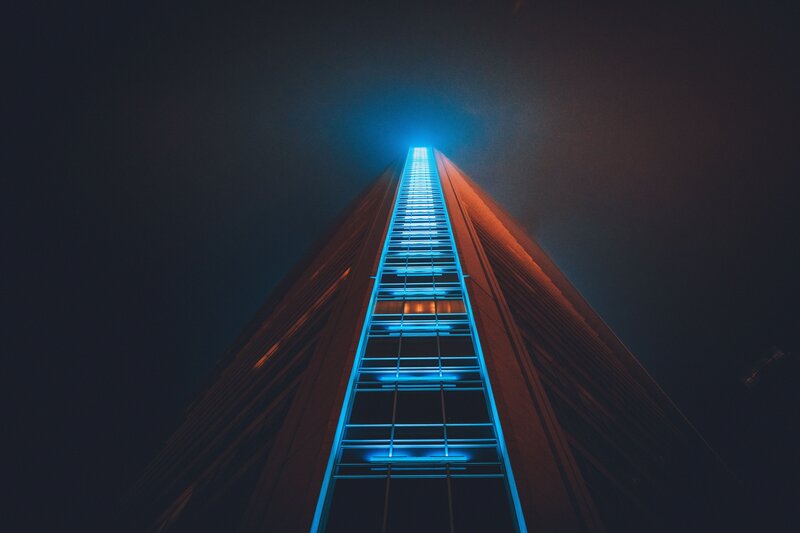 Tall Building at Night — Blue, Dramatic, Photograph, Sky