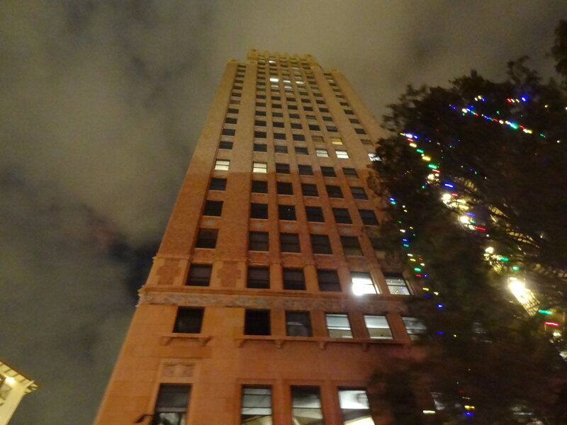 Tall Building at Night — Brown
