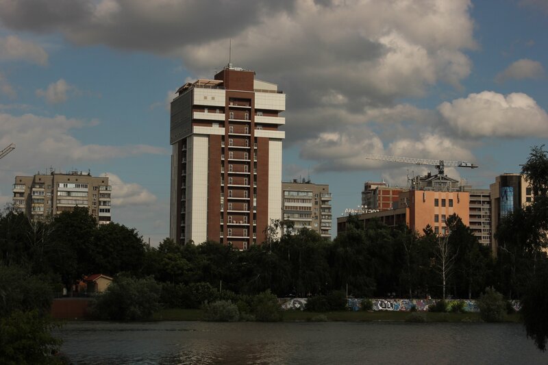 Tall Building by River