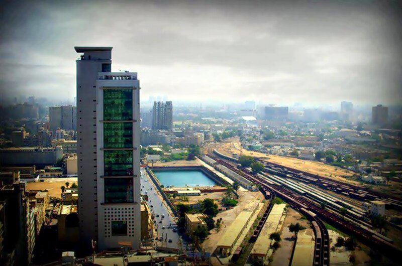 Tall Building in City — Gray, Overcast