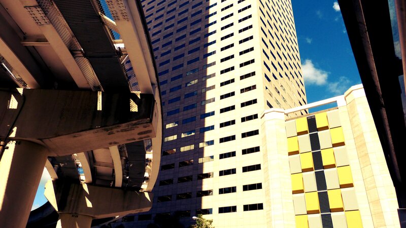 Tall Building under Bridge