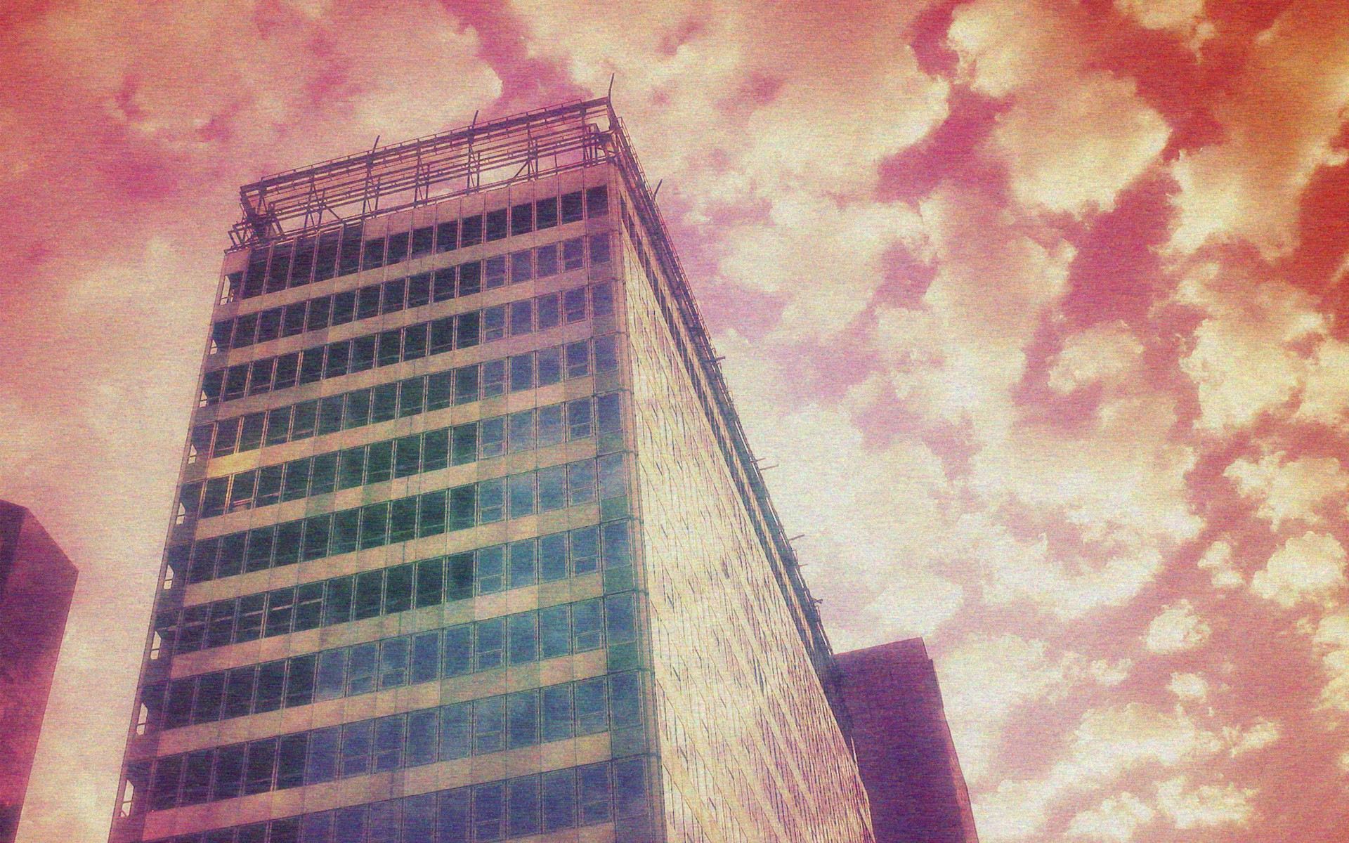 tall building under cloudy sky