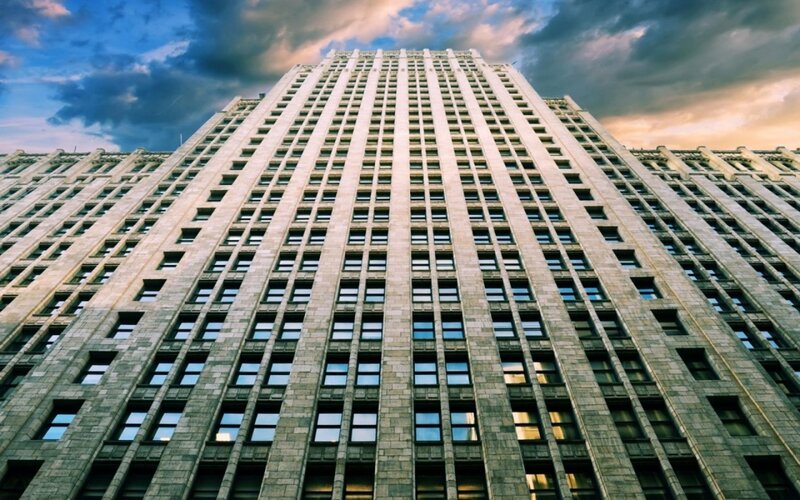 tall building under cloudy sky