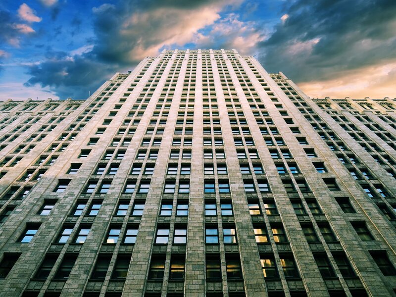 tall building under cloudy sky