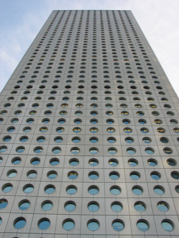 tall building with circular windows