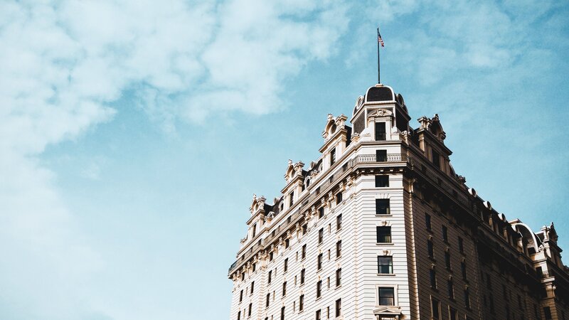 Tall Building with Flag