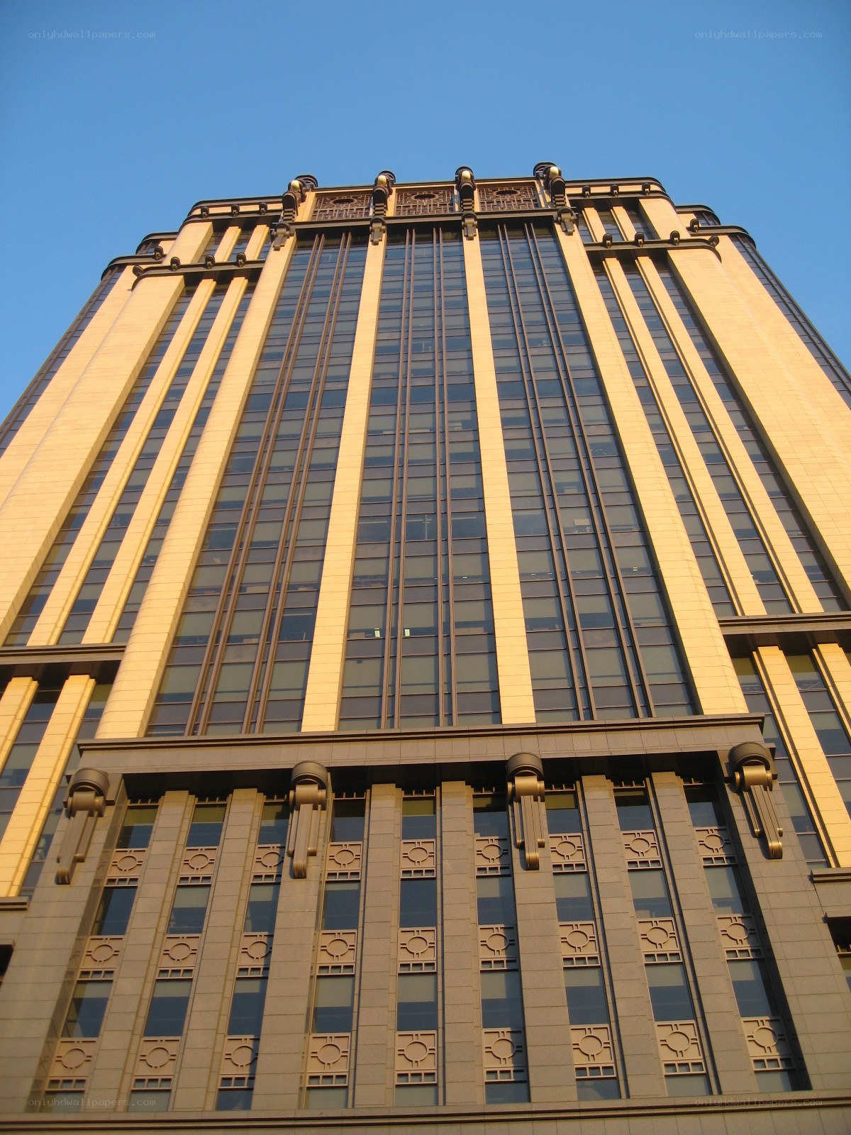 tall building with golden facade