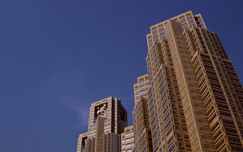 Tall Buildings Against Sky — Blue, Dramatic, Afternoon, Photograph