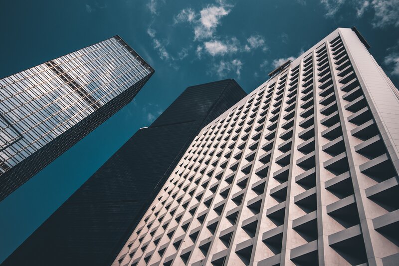 Tall Buildings Against Sky — Blue, Dramatic