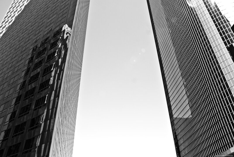 tall buildings in black and white