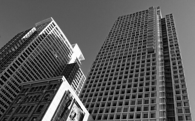 tall buildings in black and white