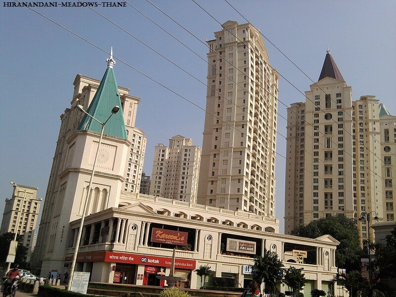 Tall Buildings in City — Beige