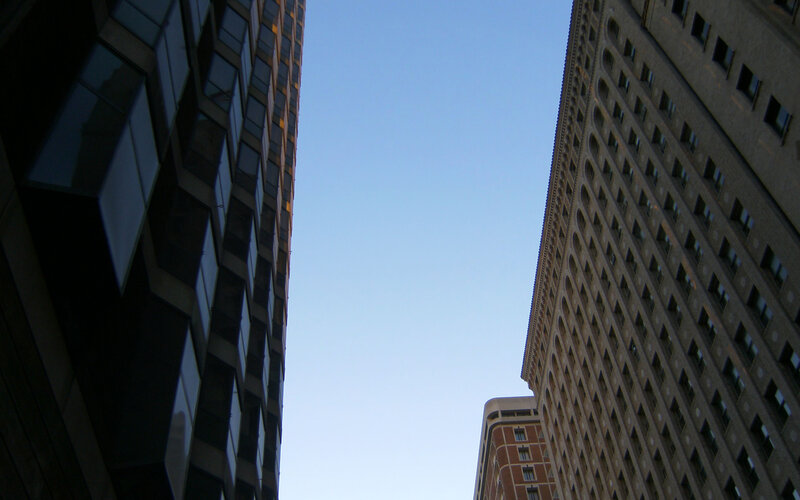 Tall Buildings in City — Blue, Dramatic, Afternoon, Photograph, Sky