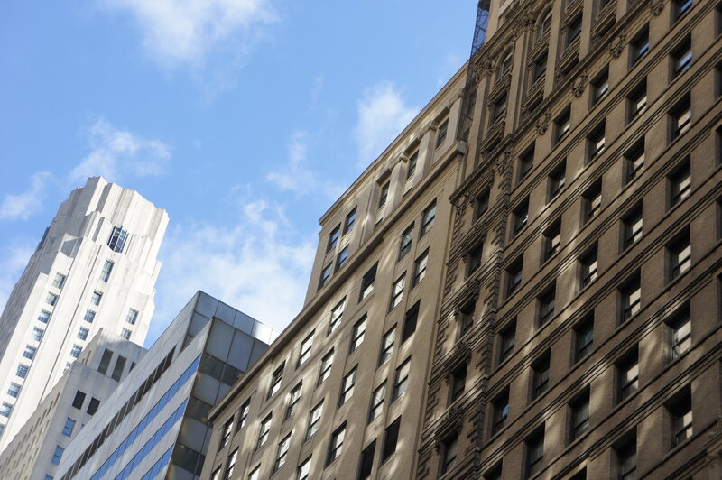 Tall Buildings in City — Brown