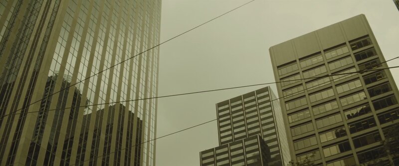 Tall Buildings in City — Gray, Dramatic, Photograph