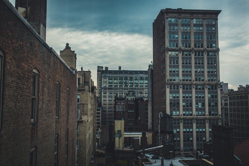 Tall Buildings in City — Gray, Dramatic