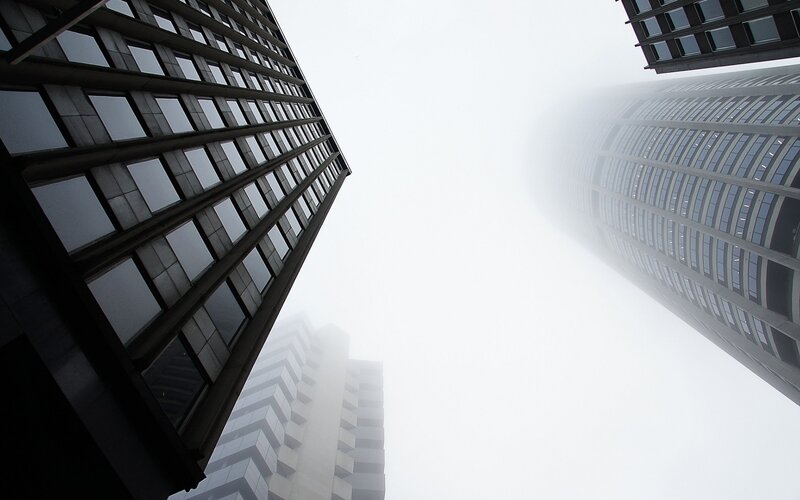 Tall Buildings in Fog — Gray, Dramatic