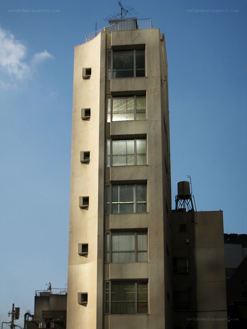 tall concrete building with windows