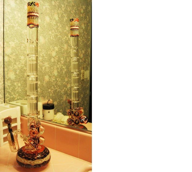 tall glass bong on counter