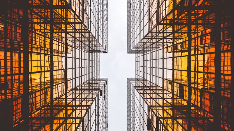 Tall Glass Buildings — Orange, Dramatic