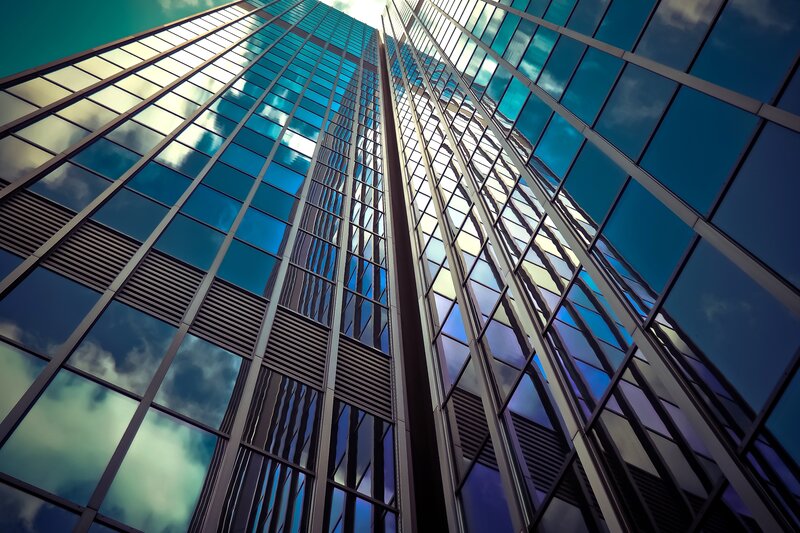 Tall Glass Skyscraper — Blue, Dramatic, Afternoon, Photograph, Sky, Clouds