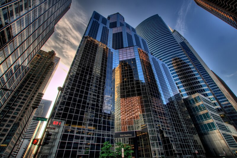 Tall Glass Skyscrapers — Blue, Dramatic, Sunset, Photograph, Buildings, Sky, Street Sign, Trees