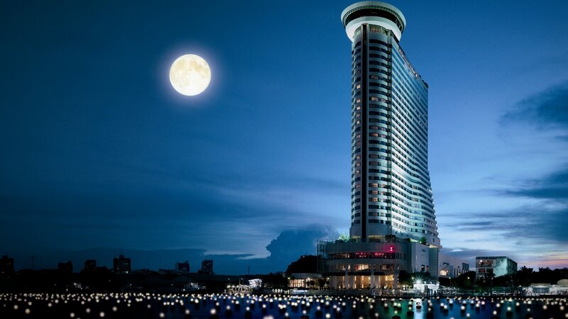 Tall Hotel Building — Blue, Serene, Night