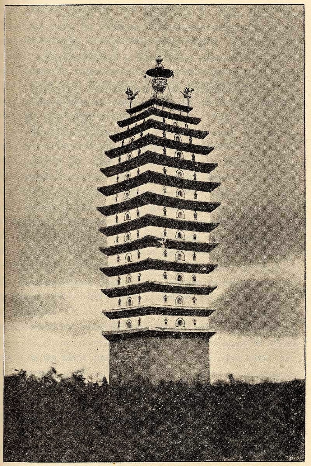 Tall pagoda in a field