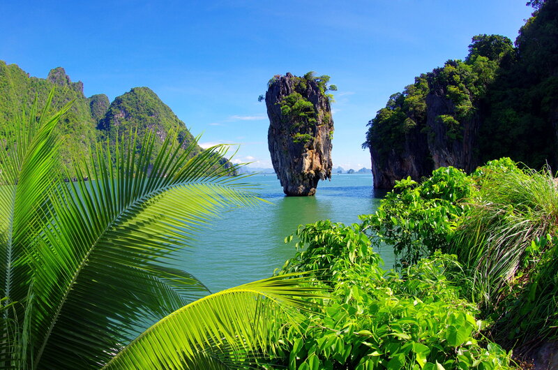 Tall Rock Formation in Sea