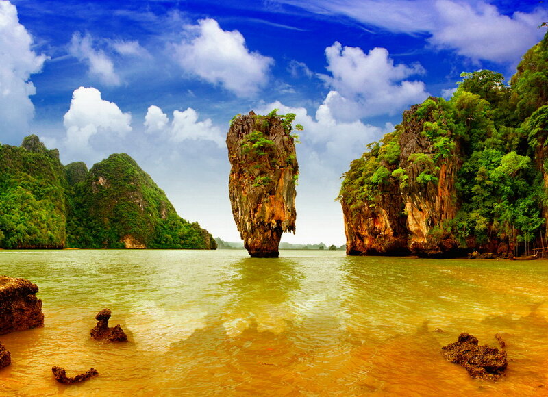 Tall Rock Pillar in Water