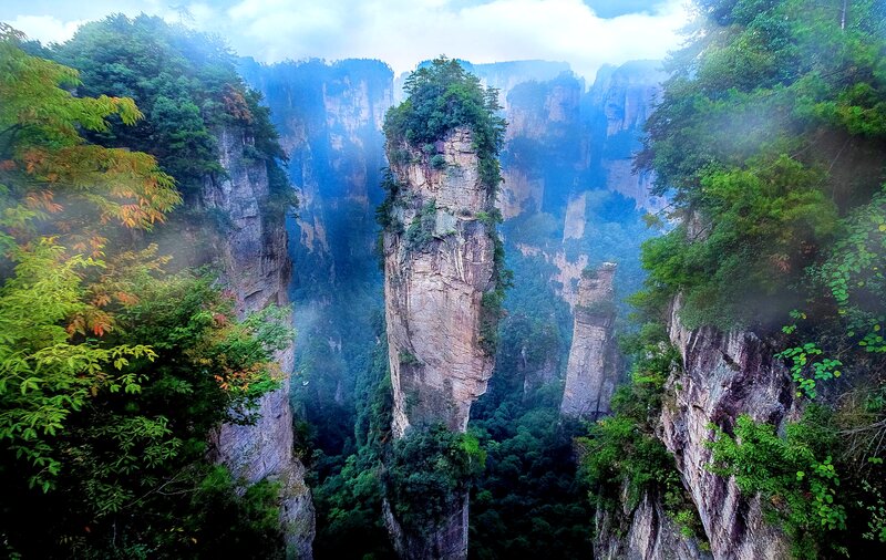 Tall Rock Pillars — Green, Serene