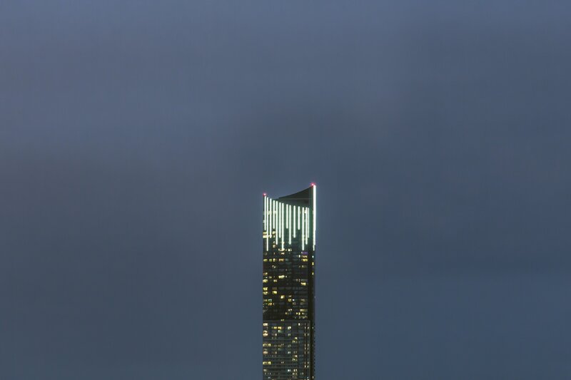 Tall Skyscraper at Night — Gray