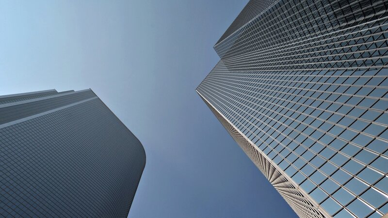 tall skyscrapers against blue sky
