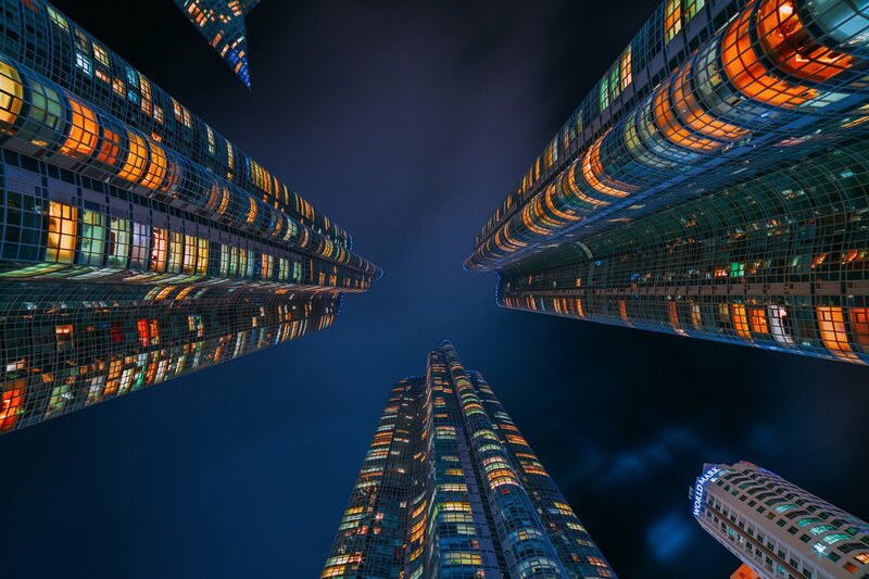 Tall Skyscrapers at Night — Blue, Dramatic, Photograph
