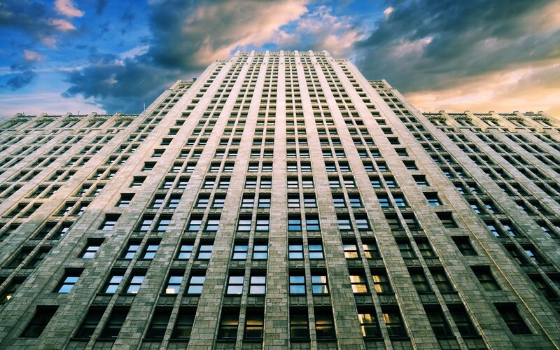 Tall Stone Building — Blue, Dramatic, Sunset