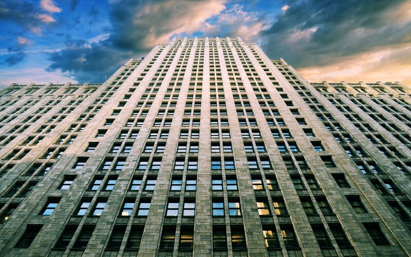 Tall Stone Building — Sunset