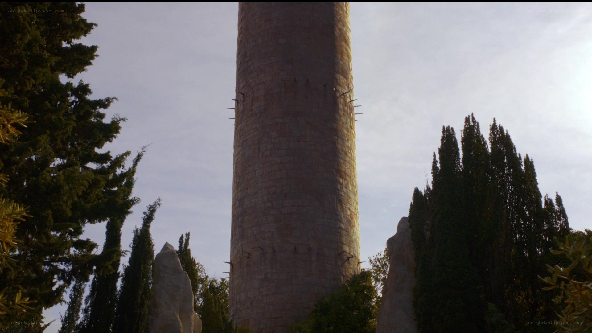 tall stone tower with spikes