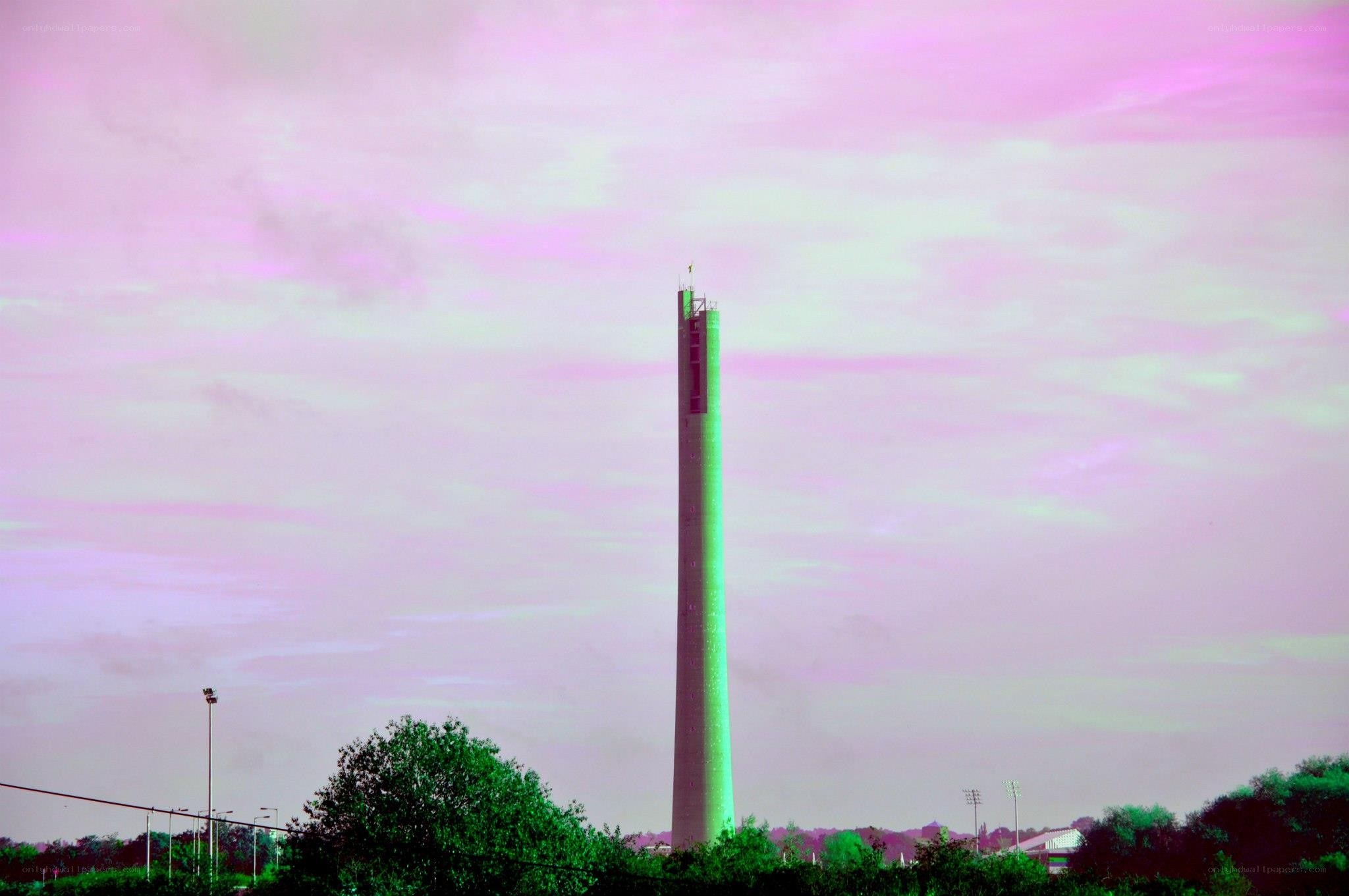 tall tower against pink sky