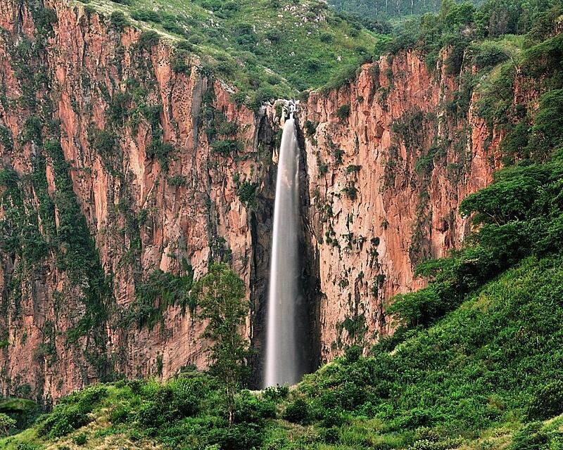 Tall Waterfall in Canyon