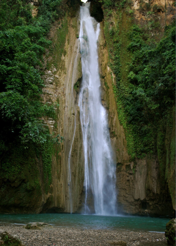 tall waterfall in forest