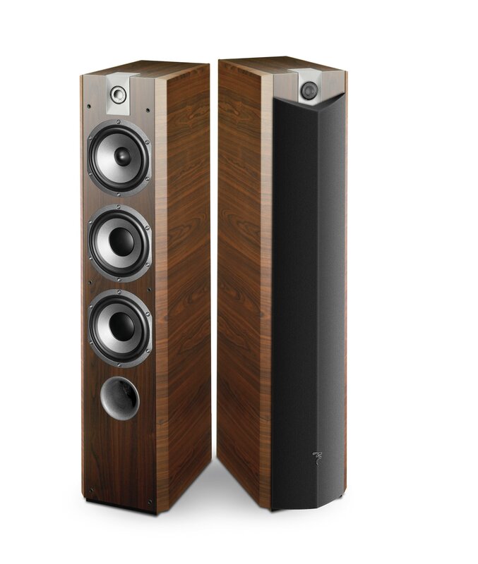 tall wooden floor-standing speakers