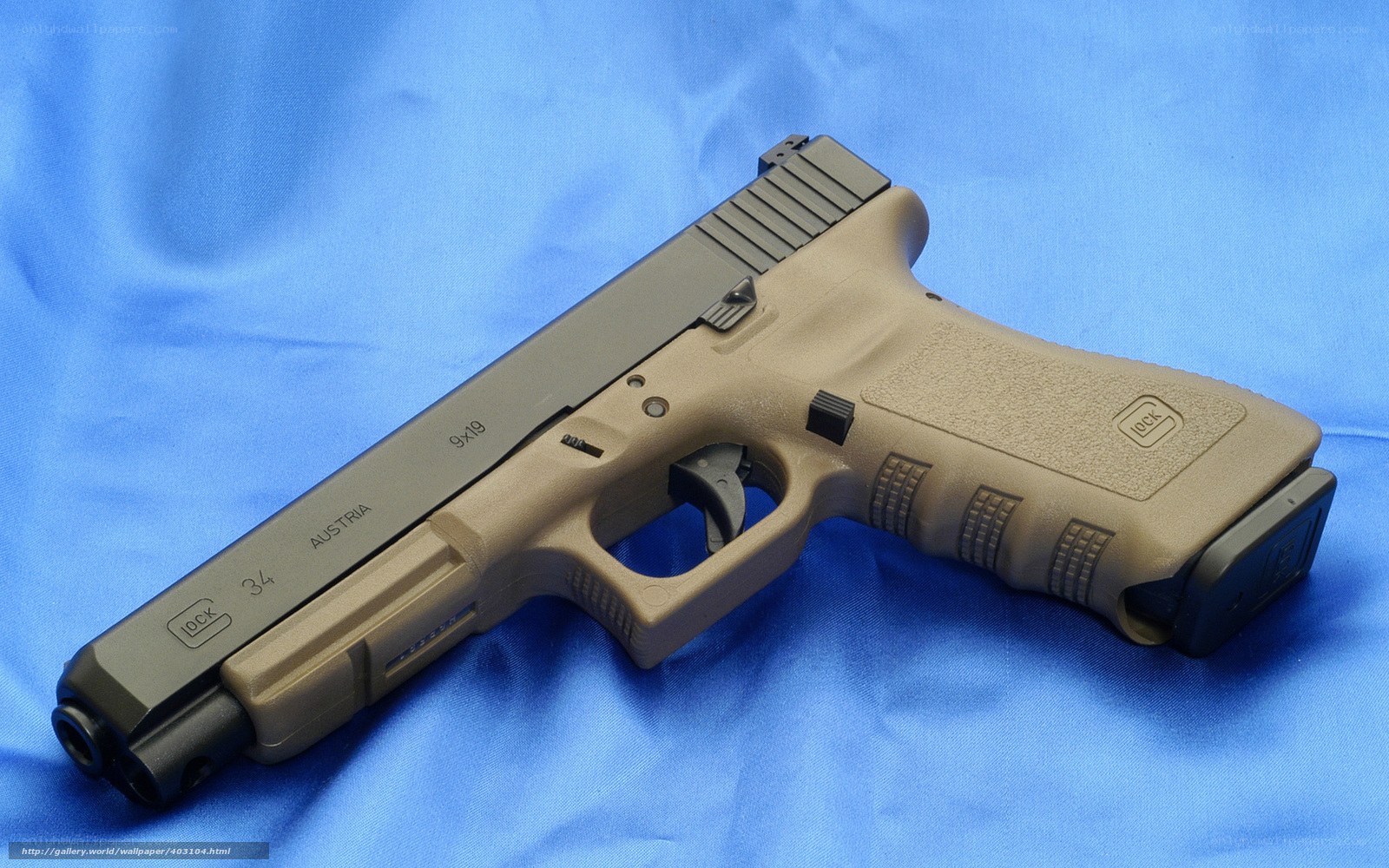 tan glock 34 pistol